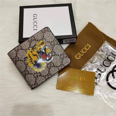 portafoglio gucci uomo tigre|La nuova linea Gucci Tiger ispirata all’anno della tigre .